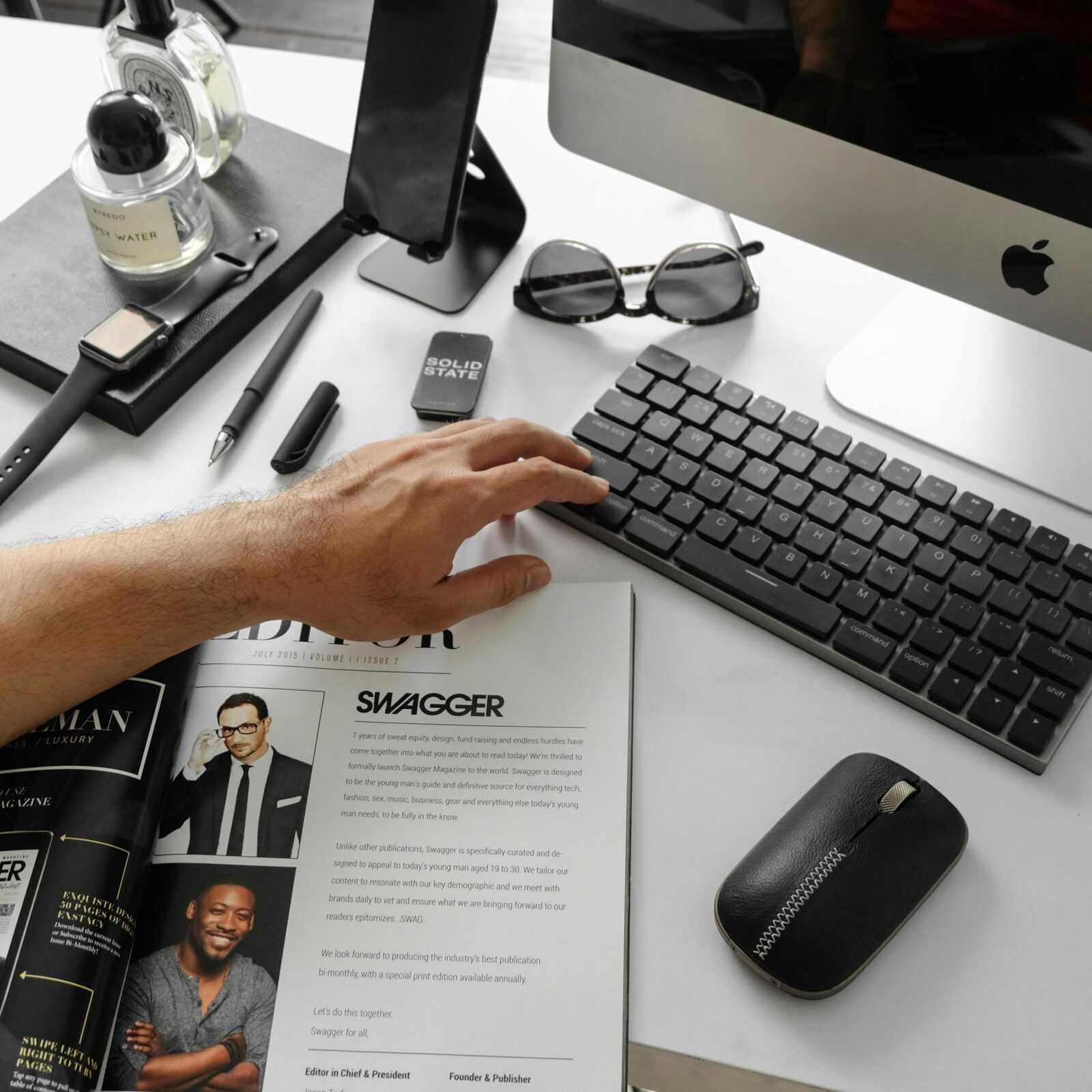 Black Wireless Keyboard Beside Mouse